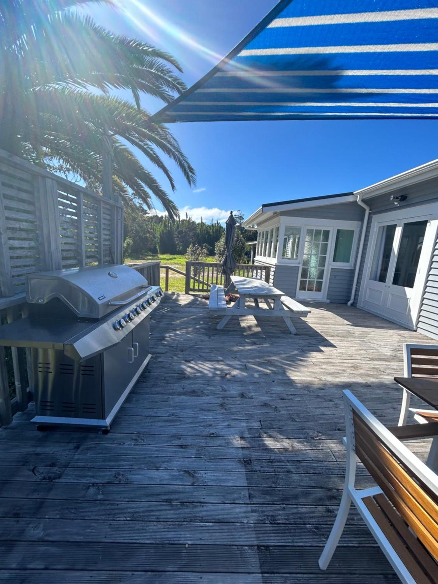 Green Turtle Cottage Pukenui ภายนอก รูปภาพ
